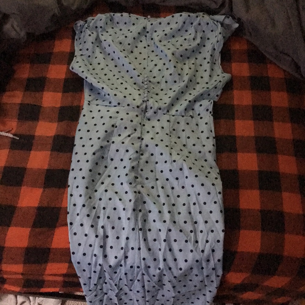 A blue and black polka dot long dress.